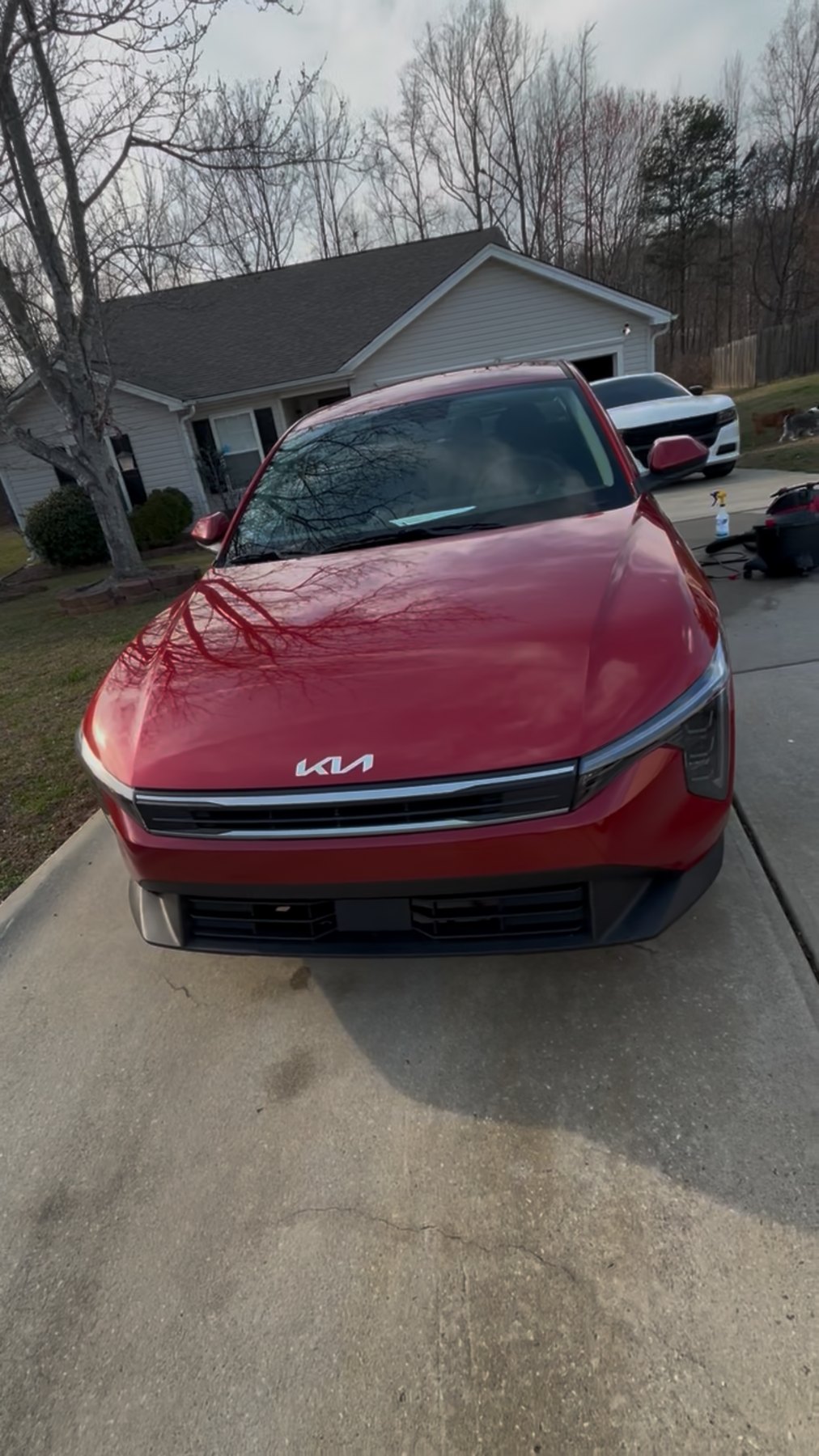 Red Kia before mobile detailing