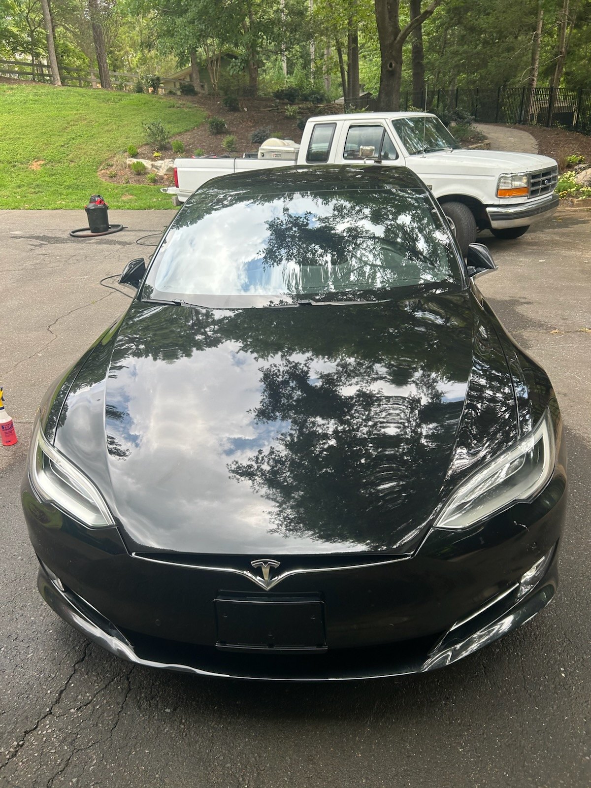 Glossy black Tesla after a mobile detail in Greensboro, NC